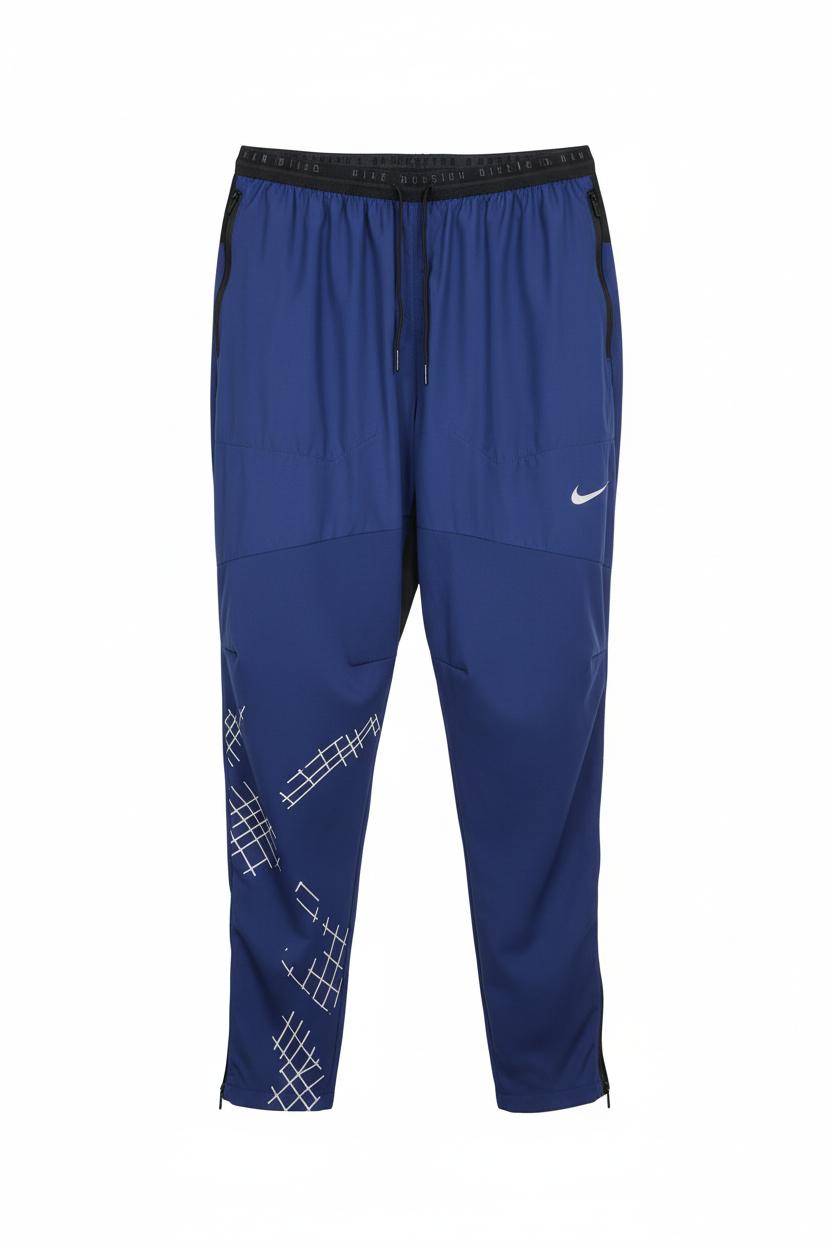 Pantalon Nike bleu sur fond blanc