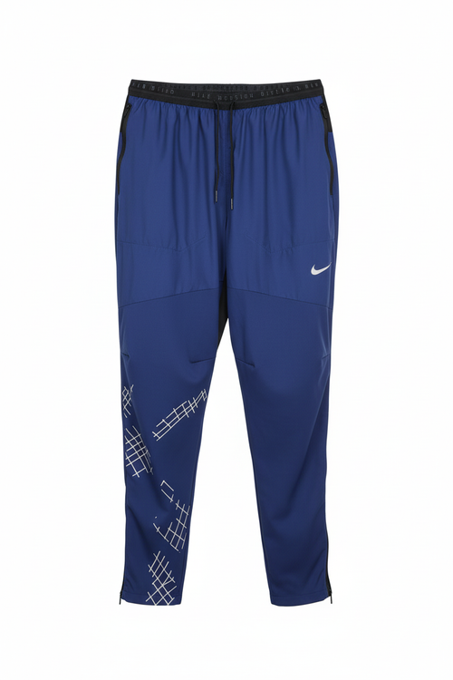 Pantalon Nike bleu sur fond blanc
