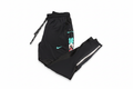 Pantalon Nike fond blanc