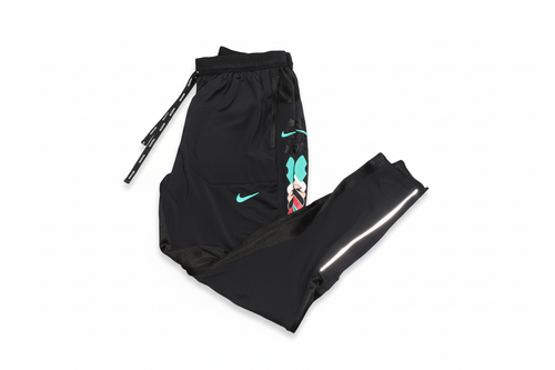 Pantalon Nike fond blanc